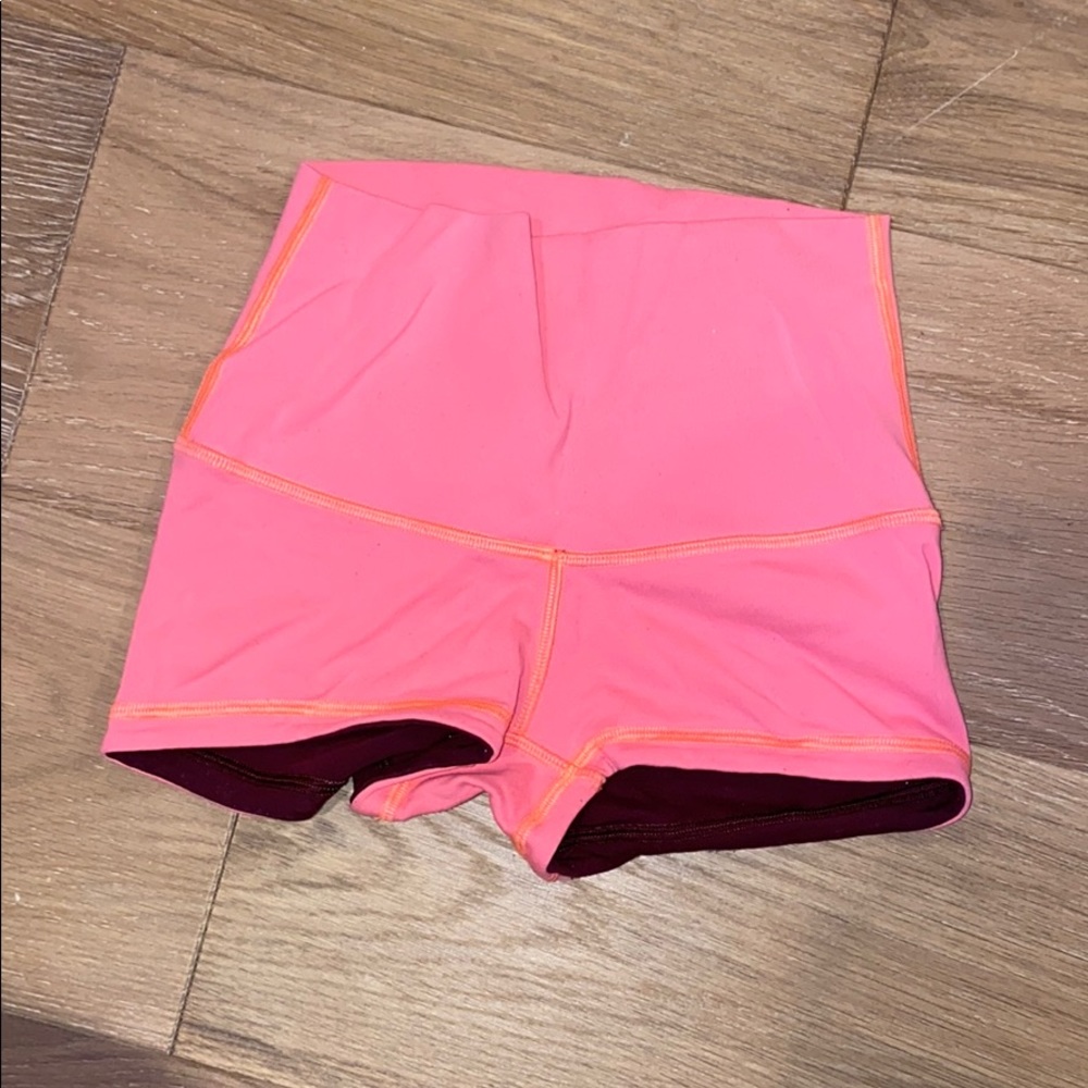 Reversible coral and burgundy lululemon spandex.